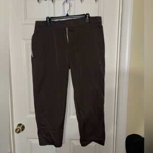 Cropped Nike pants.